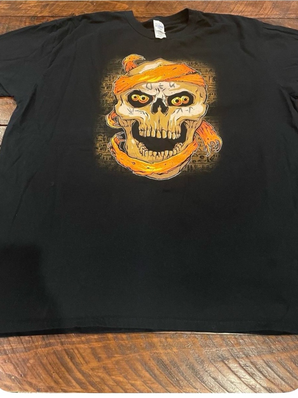 Black Graphic Skull Tee with Orange Accents